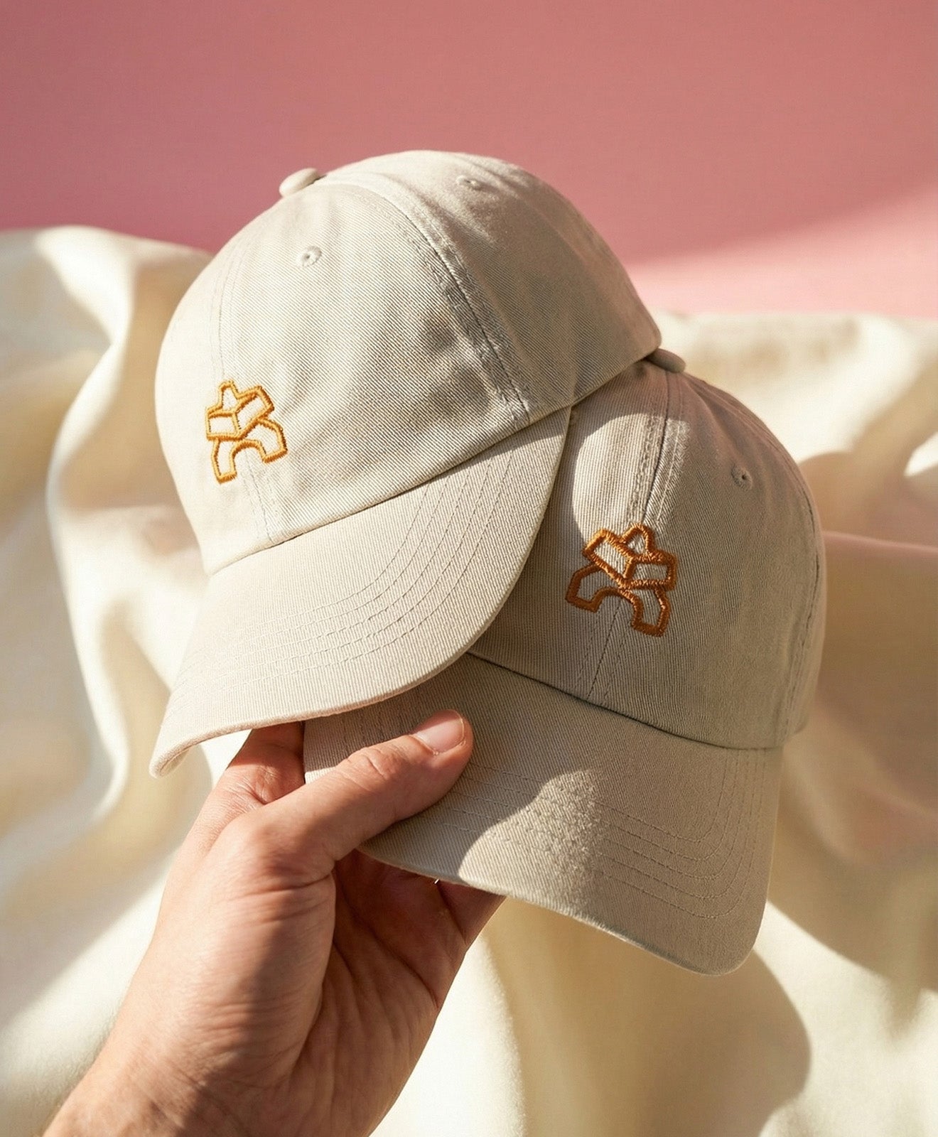 KAWENTSMANN Cap in Beige mit orangenem Logo-Stick