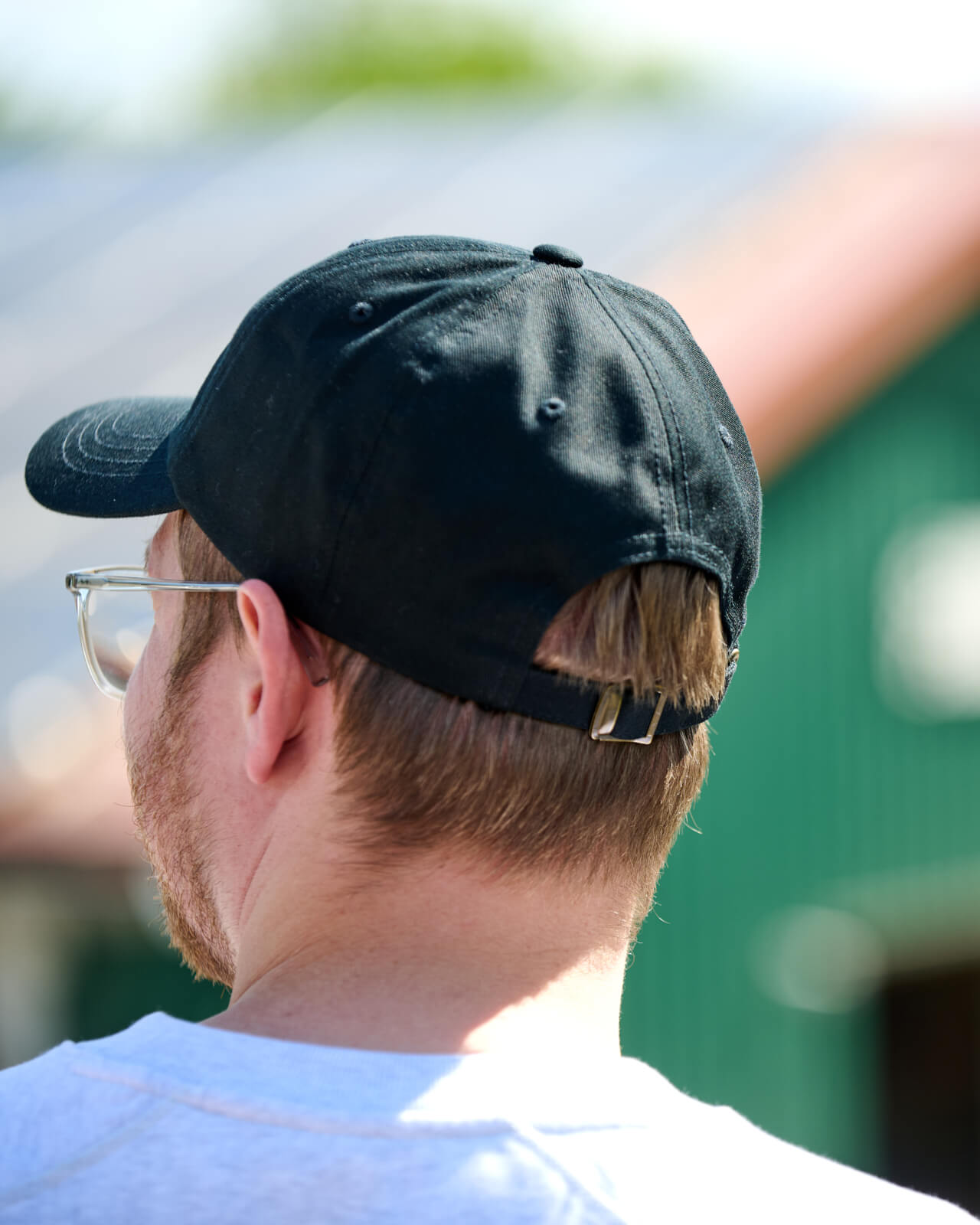 KAWENTSMANN Cap in Schwarz mit weißem Logo von hinten