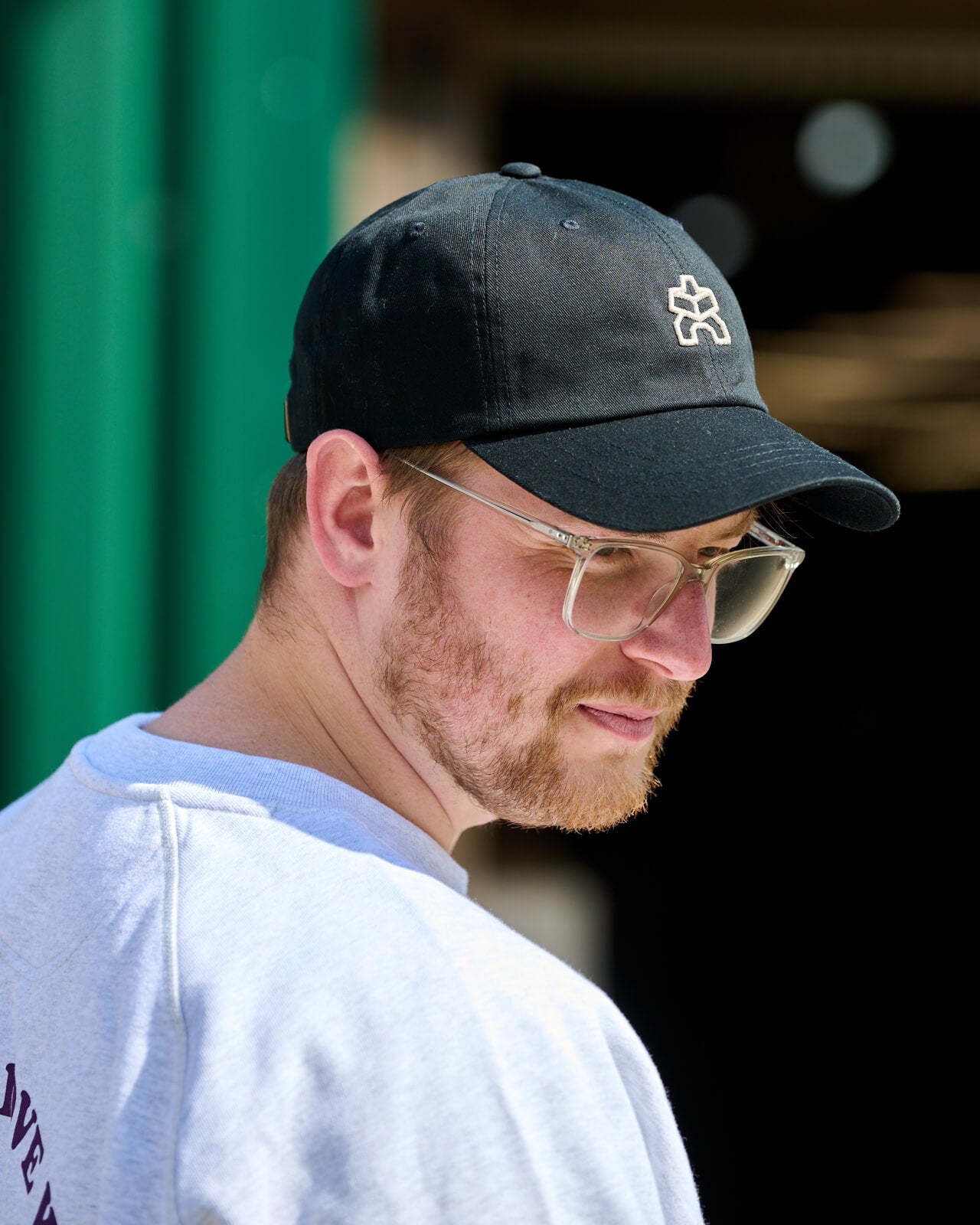 KAWENTSMANN Cap in Schwarz mit weißem Logo seitlich
