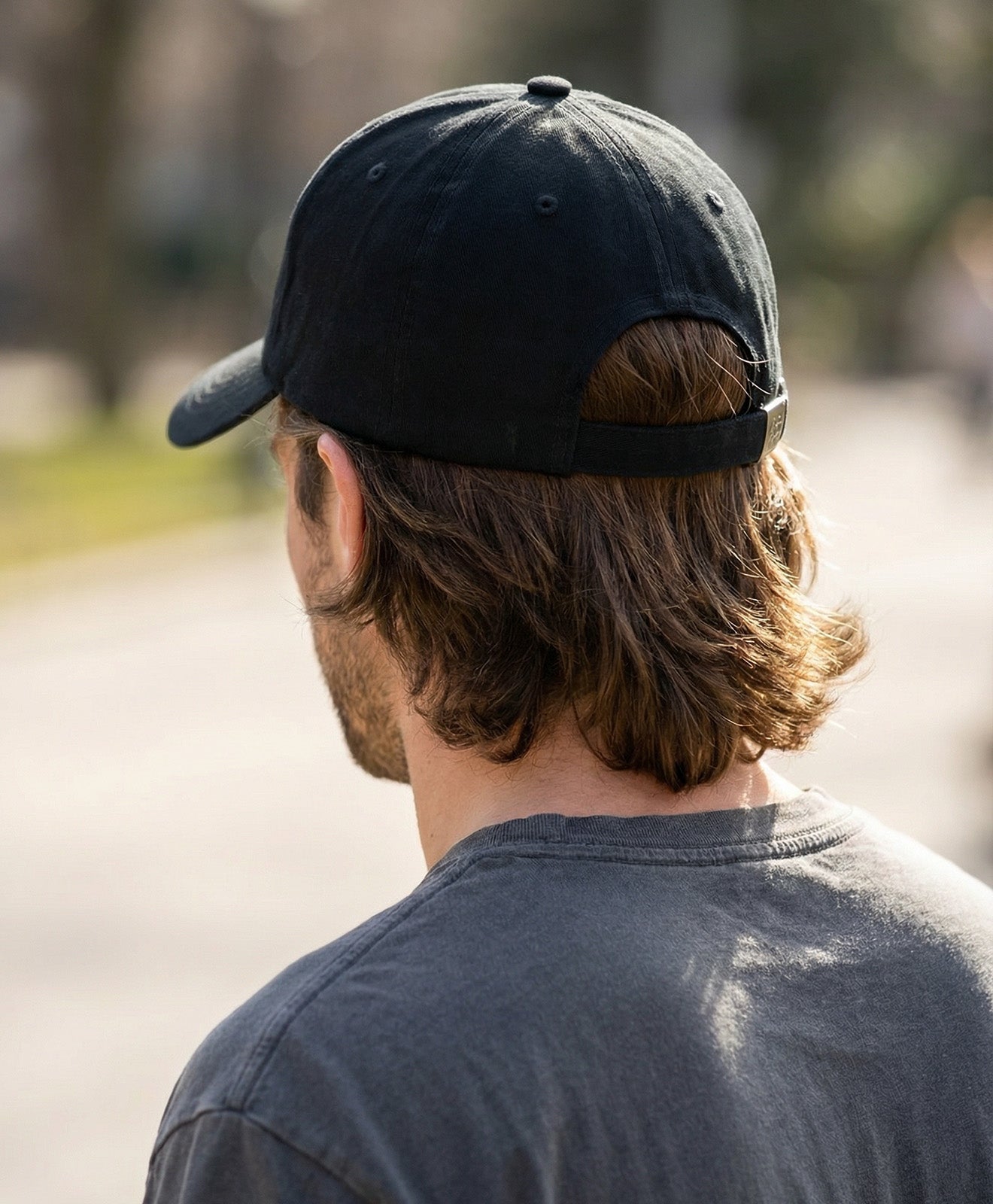 KAWENTSMANN Cap in Schwarz mit weißem Logo von vorne - Detail hinten